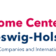 Logo des Welcome Centers Schleswig Holstein. Schriftzug in Pink und dunkelblau.